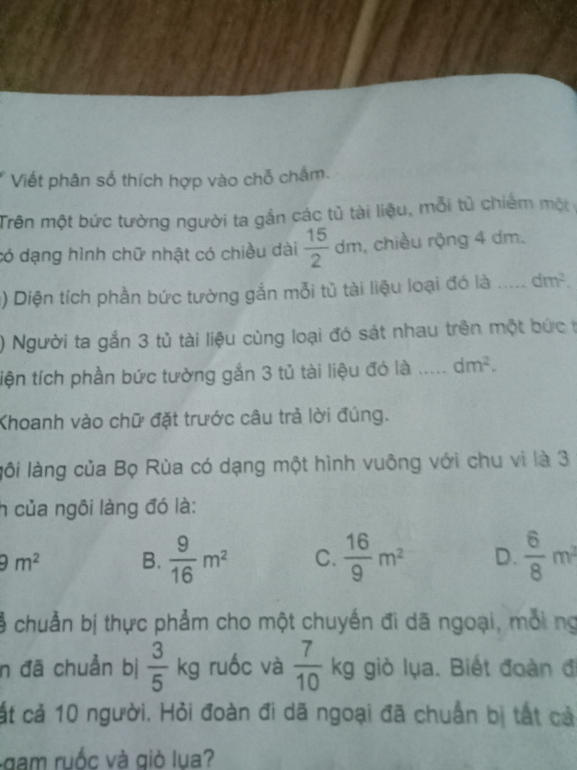 Trên một bức tường người ta gan các từ tài liệu  moi tu  chiếm một vị trí  có dang hình chữ nhật  chiều dài mười năm phần hai dm chiều rộng 4m  dien tích bức tường là