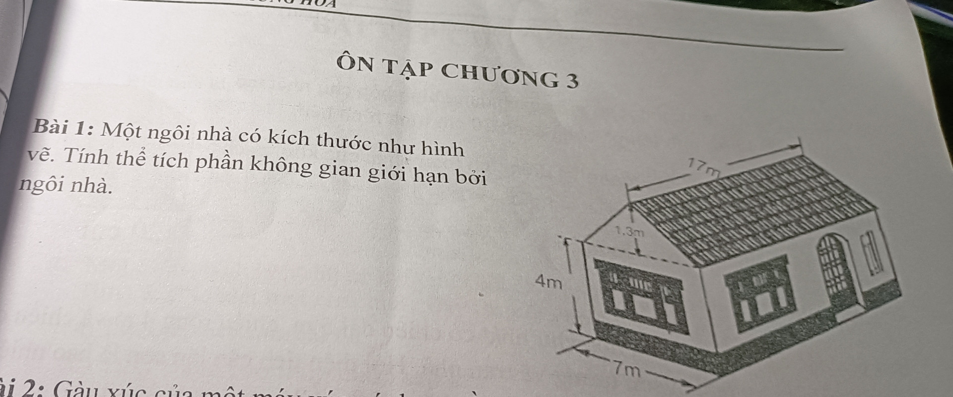 Một ngôi nhà có kích thước như hình vẽ. Tính thể tích phần không gian giới hạn bởi ngôi nhà.