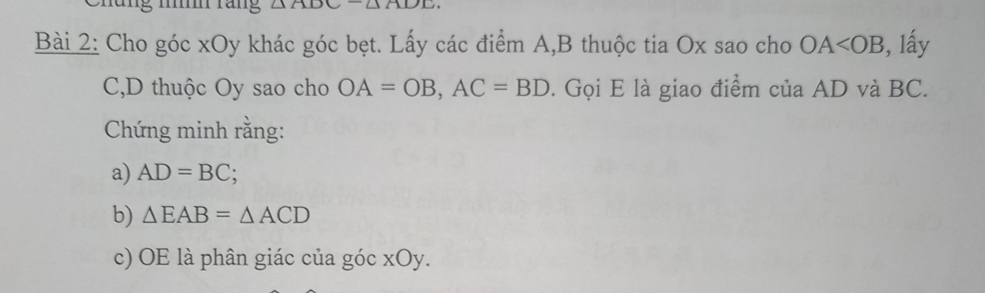 Cho góc xOy khác góc bẹt. Lấy các điểm A,B thuộc tia Ox sao cho OA<OB lấy C, D t